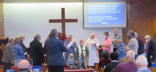 laying on hands of Rev. John Carr (COVID distanced version)